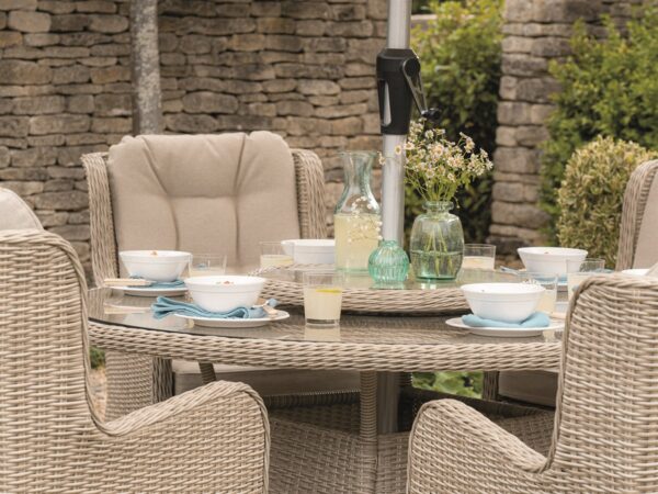 Bramblecrest Chedworth Sandstone Rattan 6 Seat Round Dining Set with Lazy Susan, Parasol & Base - Image 4